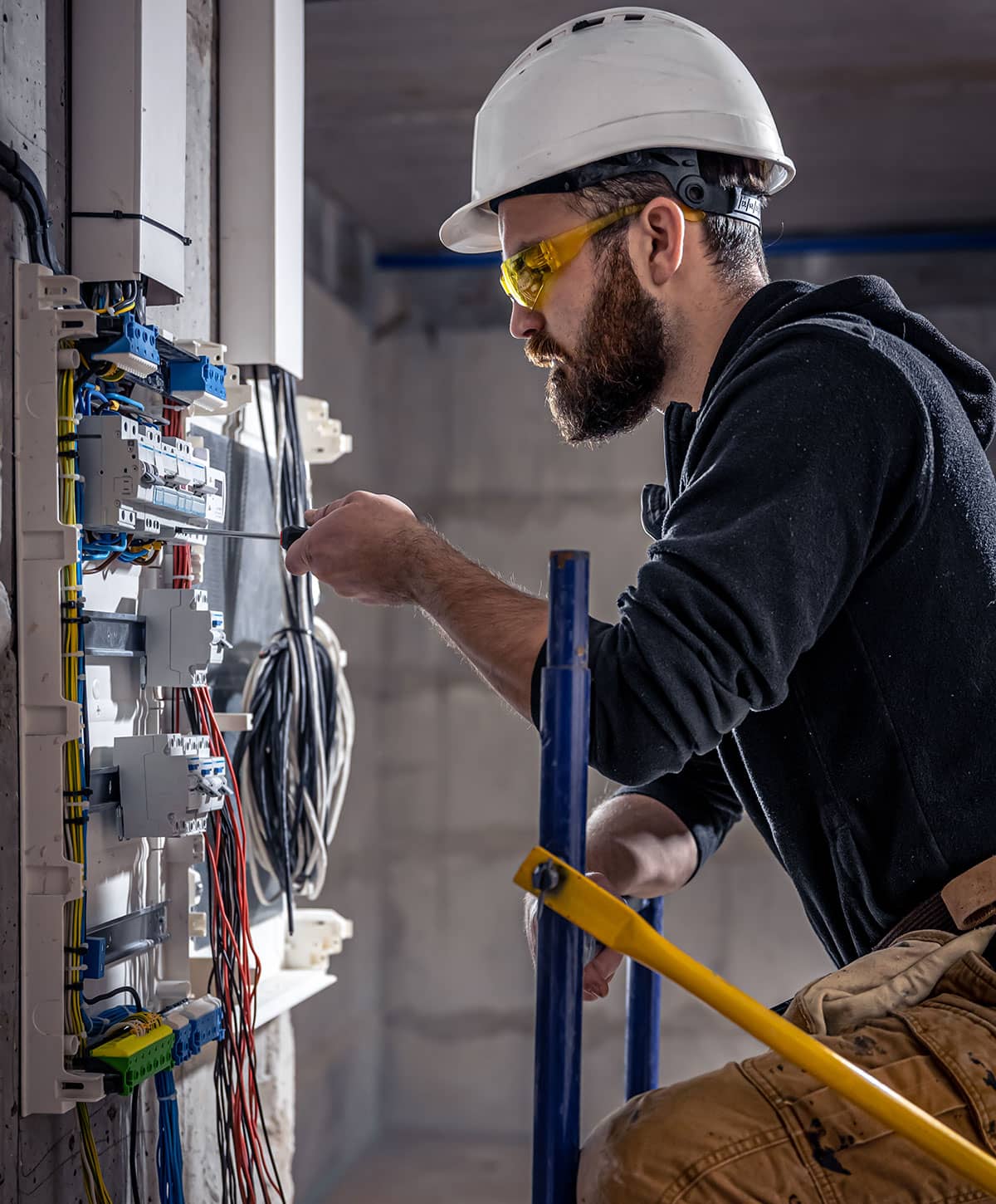 Juniper-Mountain-Electrician-Working-on-Electric-Box